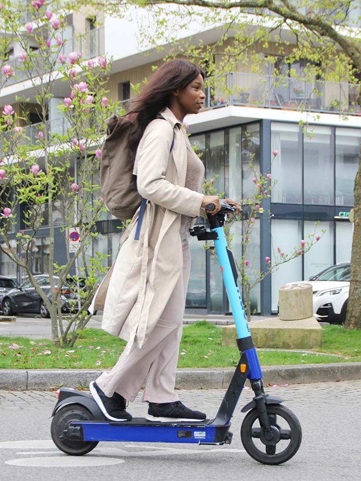 woman-riding-electric-scooter